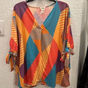 Fun multi-colored short sleeve top.